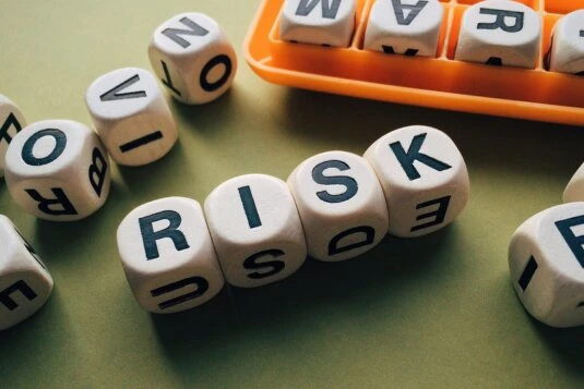 The picture of dice labelled RISK conveys the underlying importance of the threat presented by Enterprise Technical Debt.